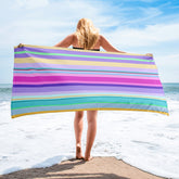 Close-up of the luxurious and absorbent Coastal Horizon Bath Towel, highlighting its beach-inspired design.